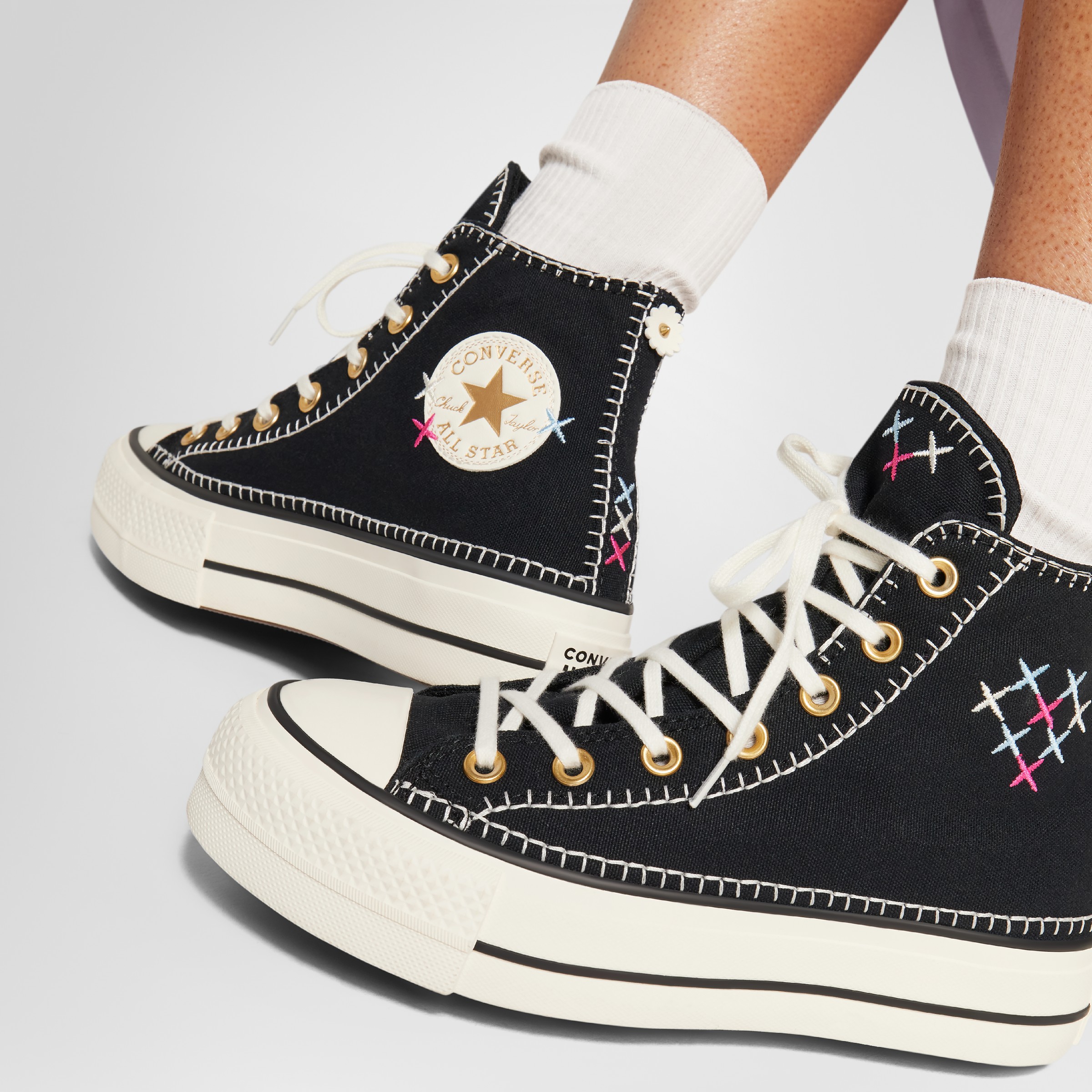 Black high top converse hotsell famous footwear